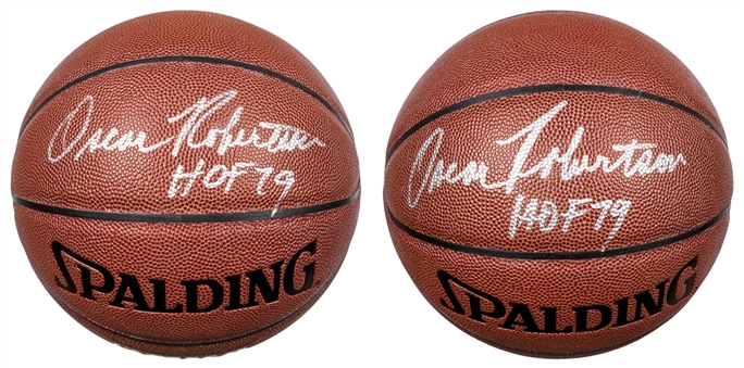 Lot of (2) Oscar Robertson Autographed Spalding Basketballs (PSA/DNA)